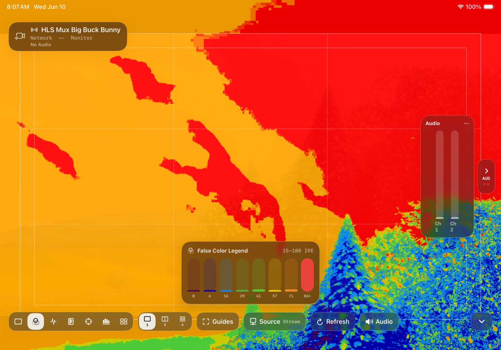 False color exposure view in StreamCoach Monitor over an HLS video source with IRE legend and safe area guides.