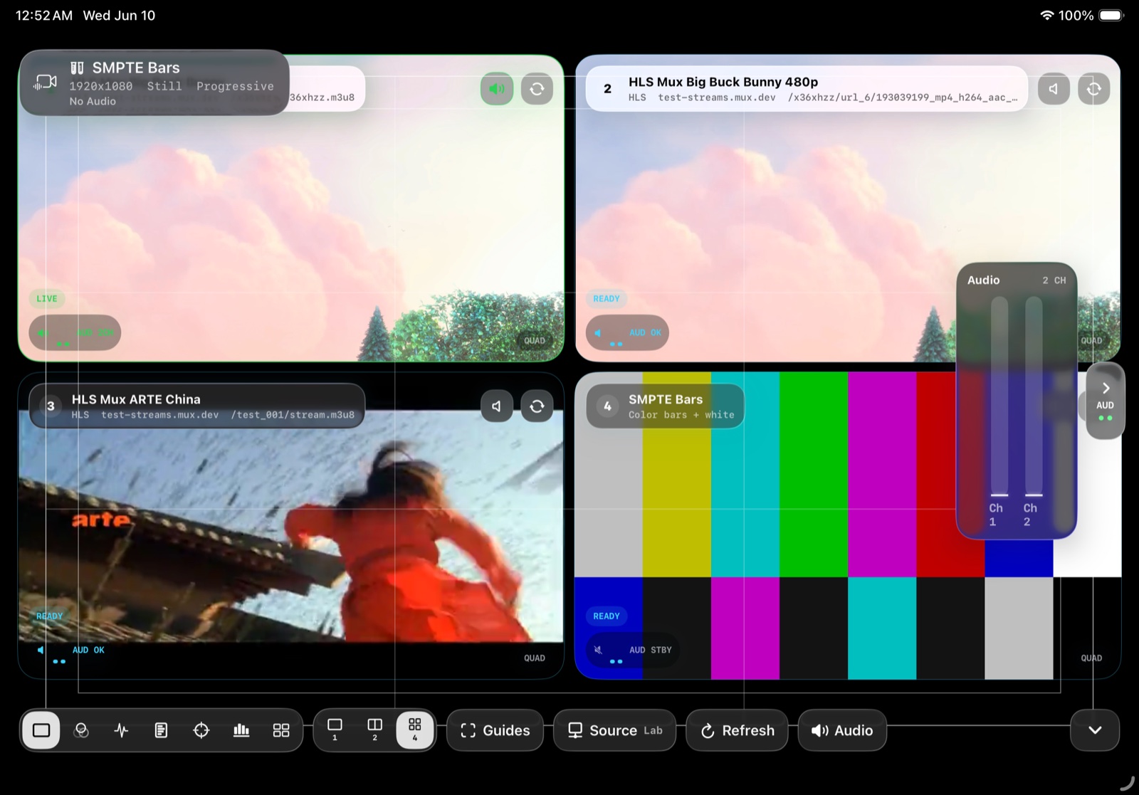 StreamCoach Monitor running a quad view with HLS streams, lab bars, guides, controls, and audio metering.